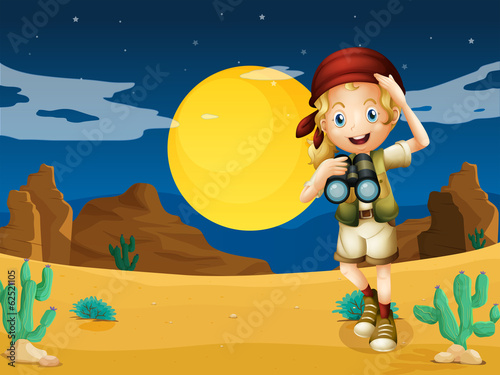 A girl at the desert with a telescope
