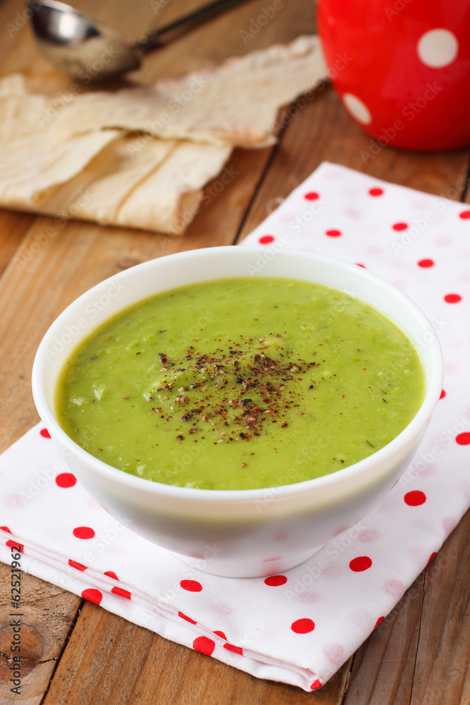 Vegan green pea soup with coconut milk with spices