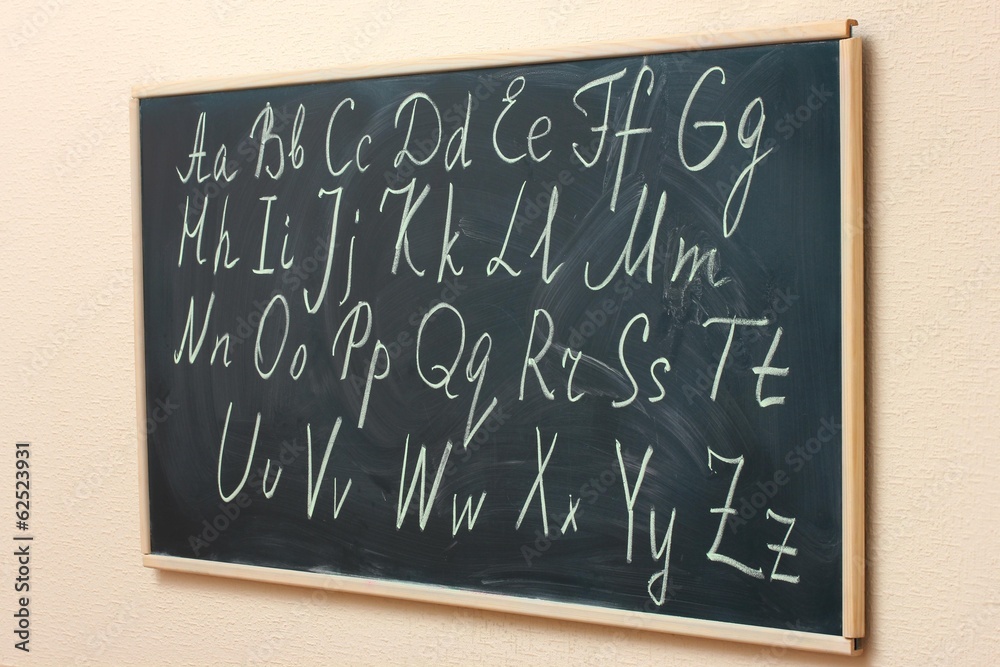 Fototapeta premium The alphabet written on the blackboard