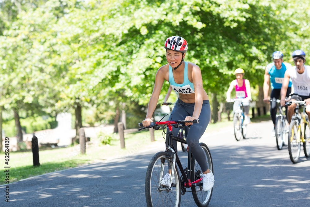 Fototapeta premium Cyclists riding bicycles