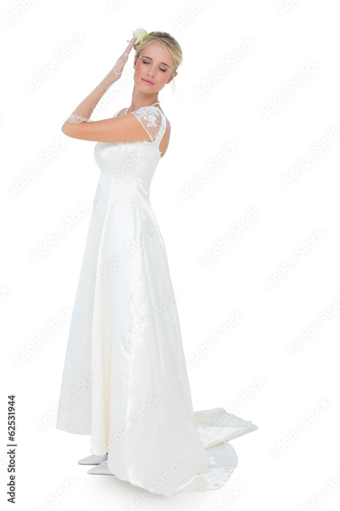 Bride with eyes closed posing against white background Bride with eyes closed posing against white background