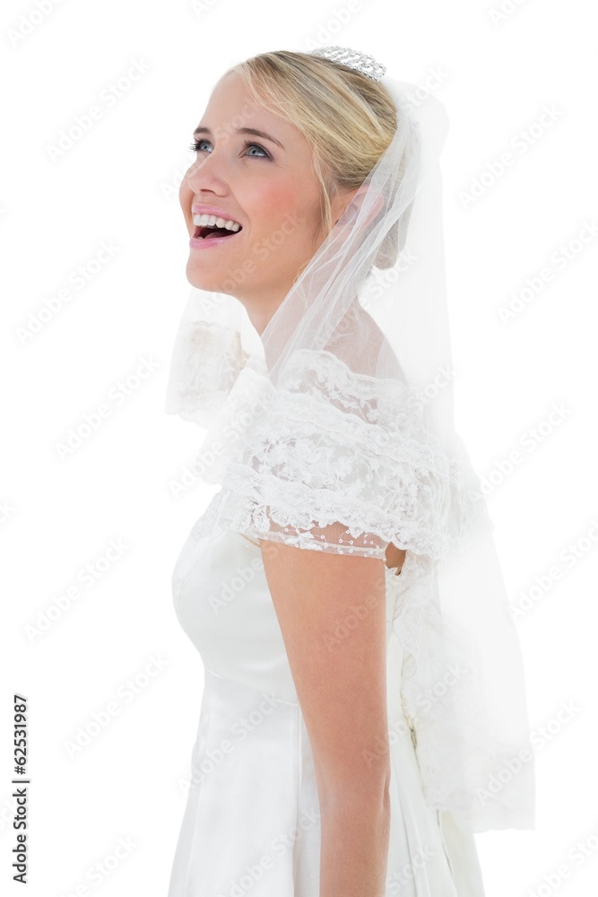 Surprised woman in wedding dress over white background Surprised woman in wedding dress over white background