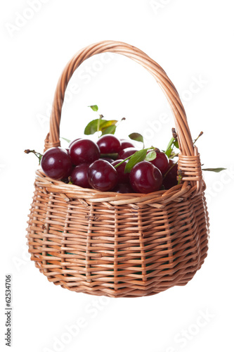 Ripe cherries in a wattled basket