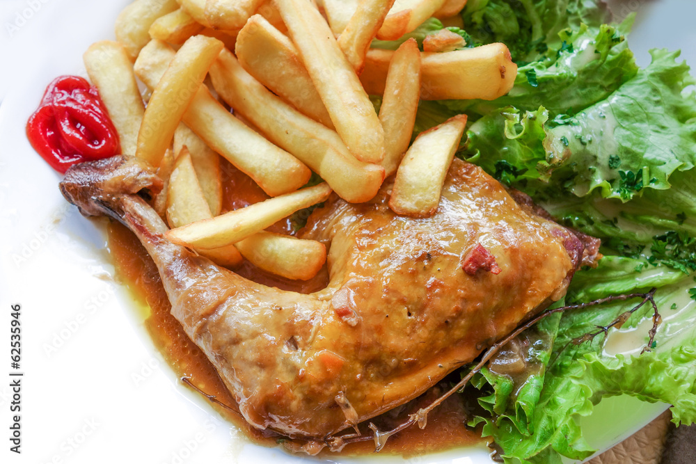 chicken with rice and golden French fries