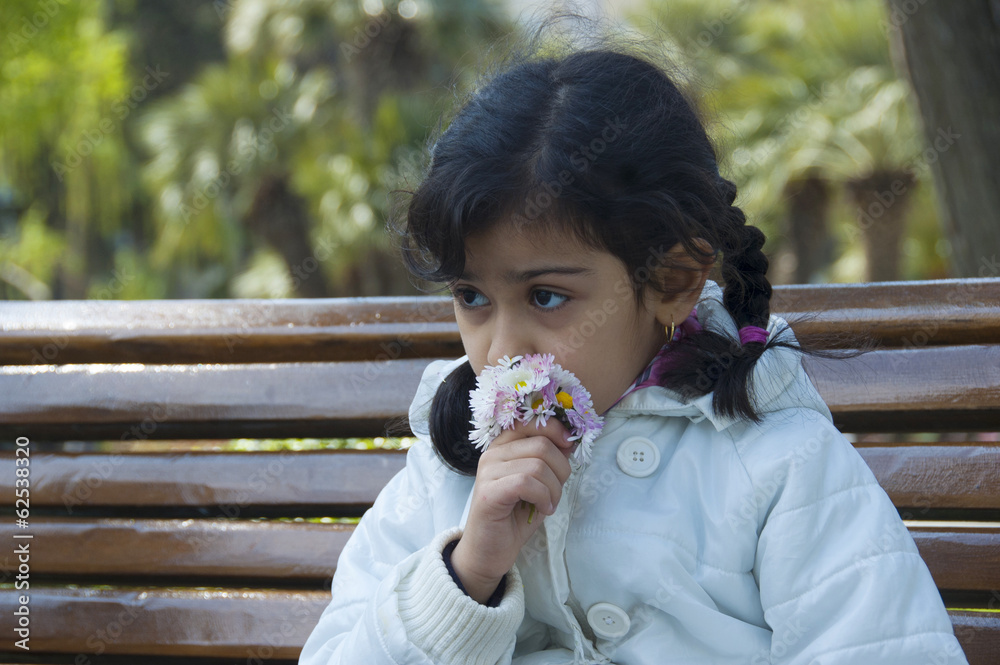 Cute child with flowers