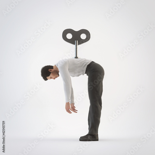 Cuadro en lienzo Businessman with a key winder on her back sleeping