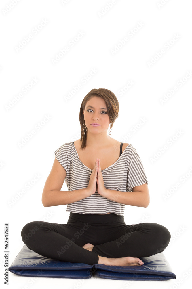 pretty brunette in white active wear doing yoga on white pretty brunette in white active wear doing yoga on white