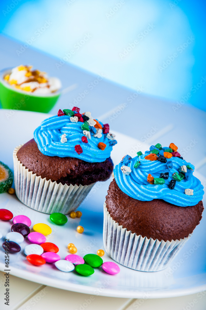 Home baked sweets on the bright, blue background