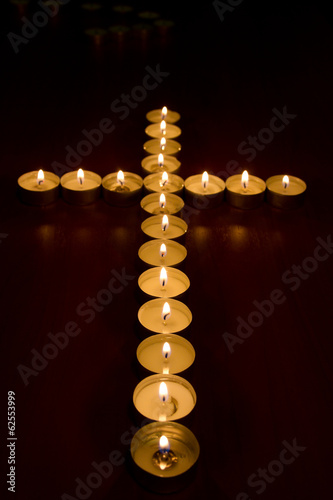 candles in the shape of a cross