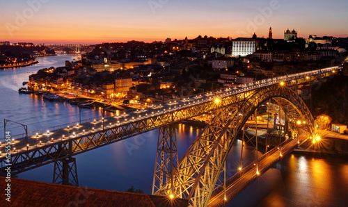 Oporto at river Douro and Dom Luis bridge after sunset