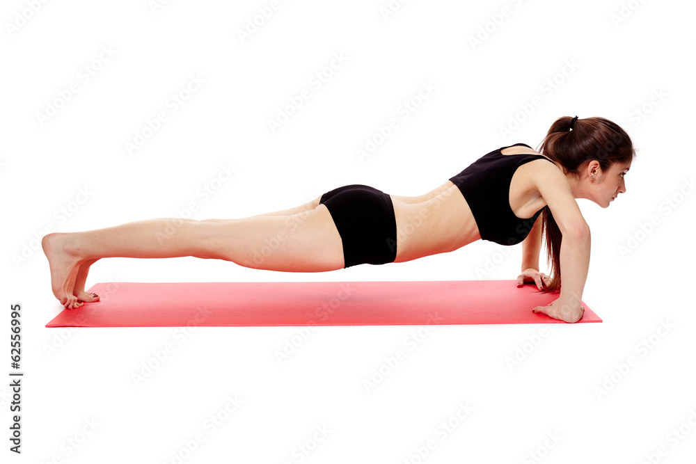 Athletic woman doing pushups Athletic woman doing pushups