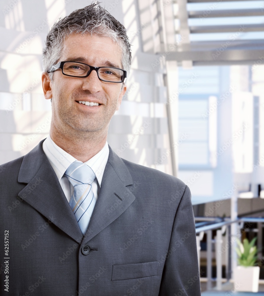 Portrait of happy mid adult business advisor Portrait of happy mid adult business advisor