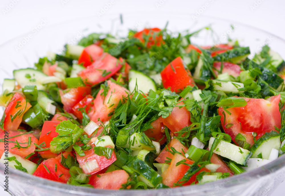 Fresh vegetable salad in glass bowl Fresh vegetable salad in glass bowl