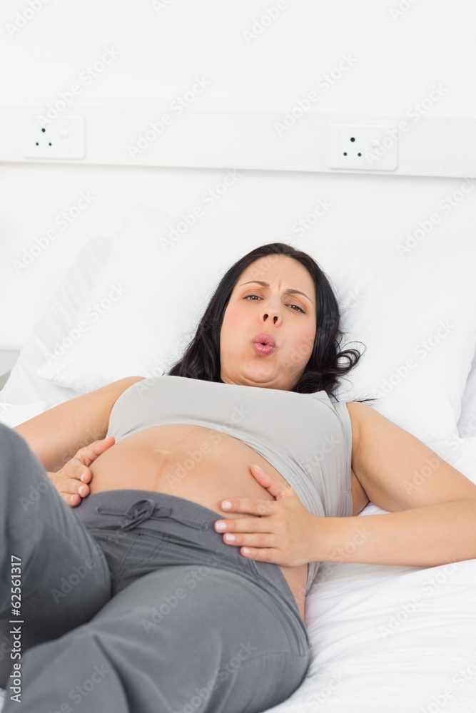 Portrait of pregnant woman suffering from pain Portrait of pregnant woman suffering from pain