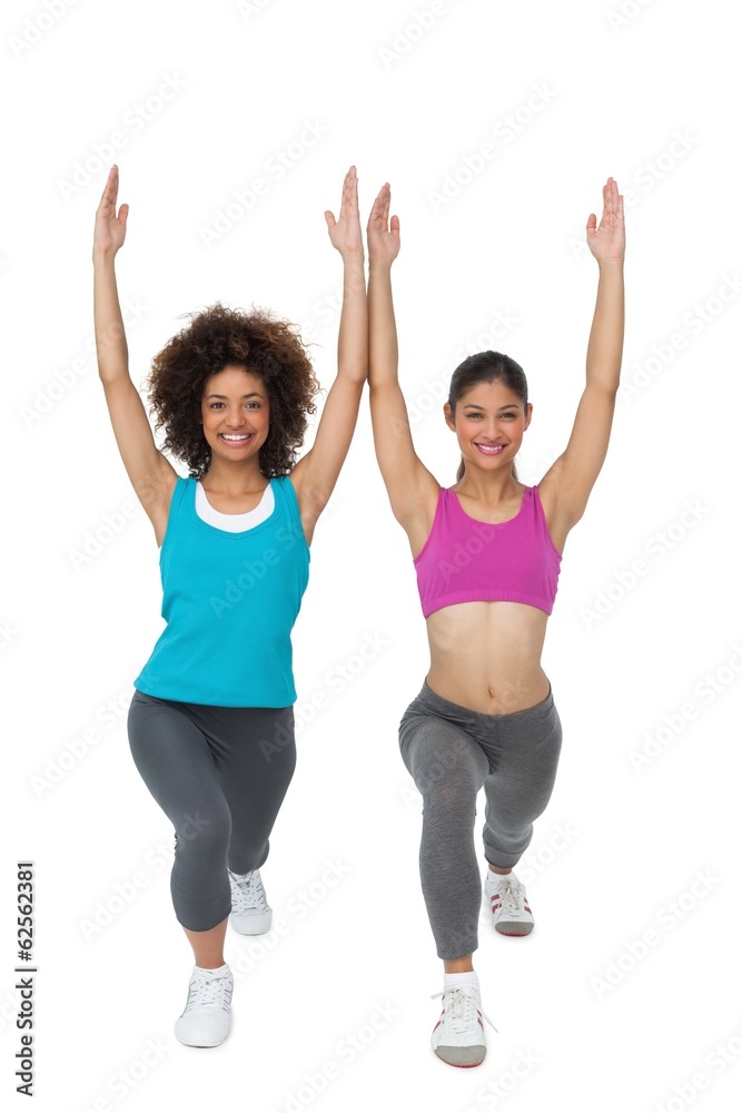 Full length of women doing power fitness exercise Full length of women doing power fitness exercise