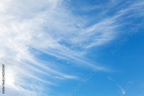 Natural background texture of bright blue cloudy sky