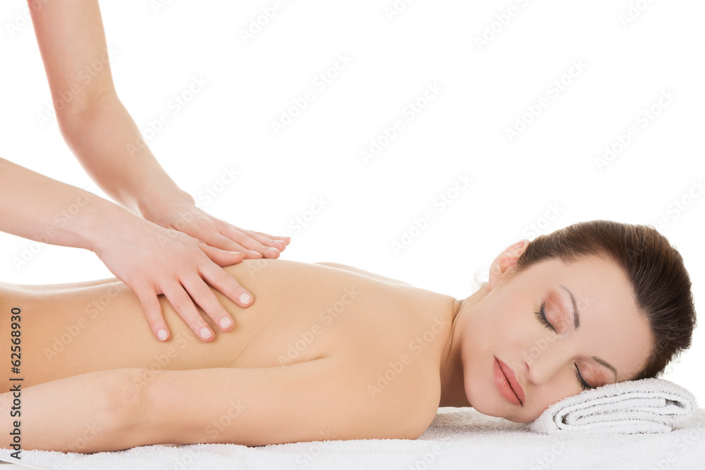 Woman relaxing beeing massaged in spa saloon Woman relaxing beeing massaged in spa saloon