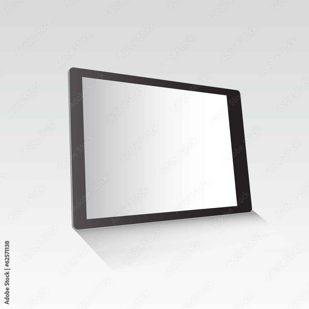 Digital tablet standing on grey surface Digital tablet standing on grey surface