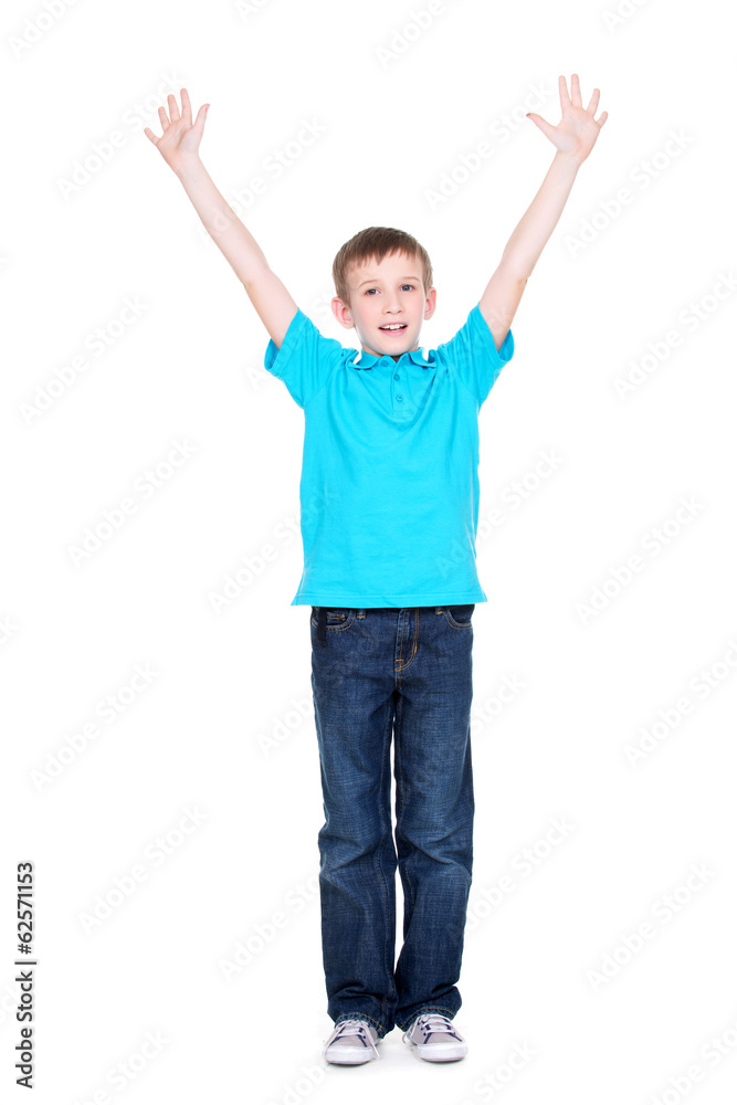 Happy boy with raised hands up.