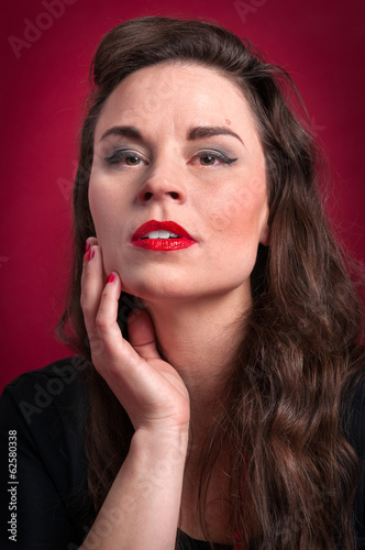 Woman Portrait Against Red Background