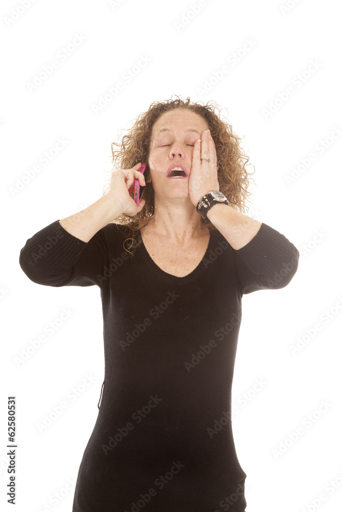 woman black shirt pink phone hand on face
