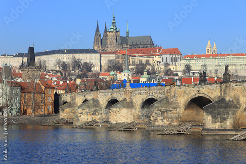 Prague gothic Castle and Charles Bridge with its Statues