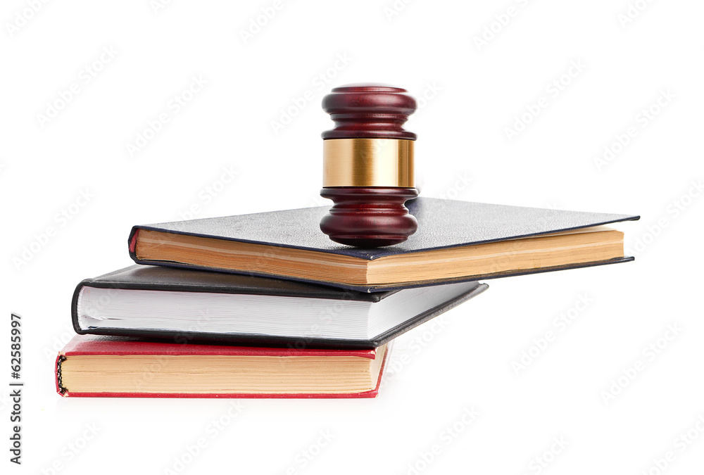 Judge's gavel on red legal book