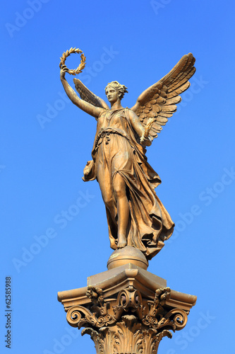 Photography Golden Angel in front of House of Artists, Prague