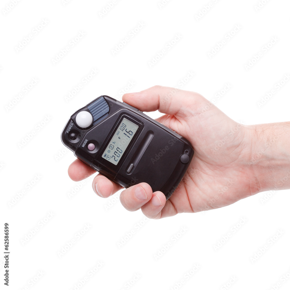 flash meter in hand on white background flash meter in hand on white background