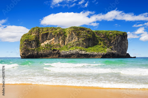 Castro islet in Andrin beach, Llanes (Asturias), Spain photo