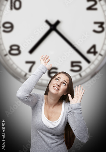 Clock and woman with grey background