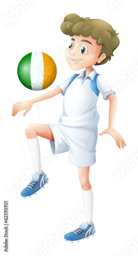 A football player using the ball with the flag of Ireland