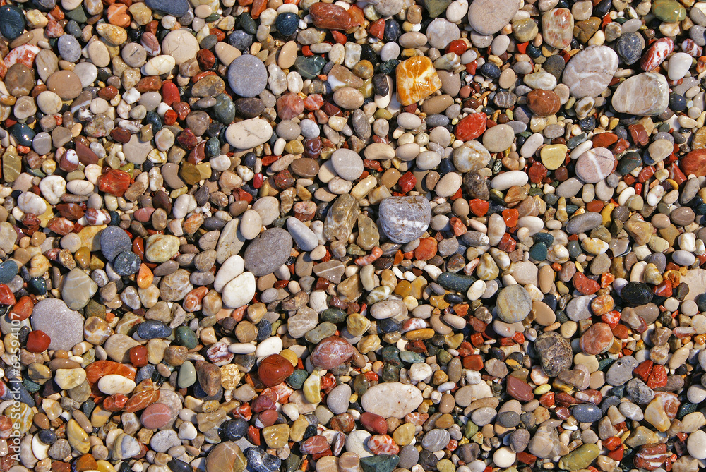 A lot of small pebbles on the ground A lot of small pebbles on the ground