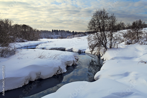 Serene winter evening by the river © Yuriy Kirsanov