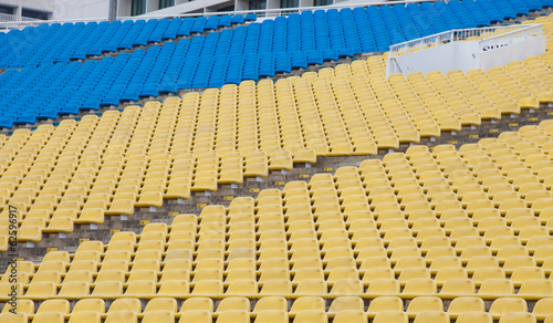 Stadium seats in yellow and blue color