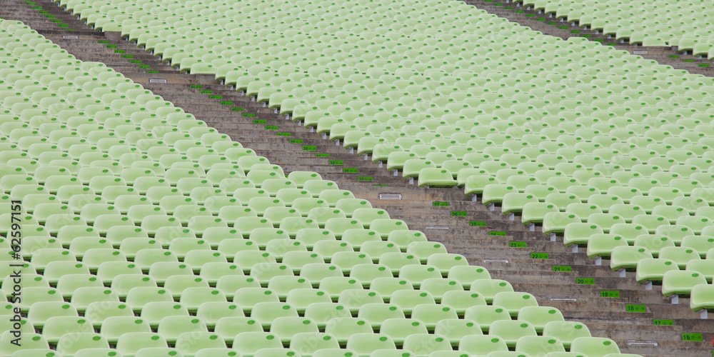 Fototapeta premium Siedziska stadionowe w kolorze zielonym