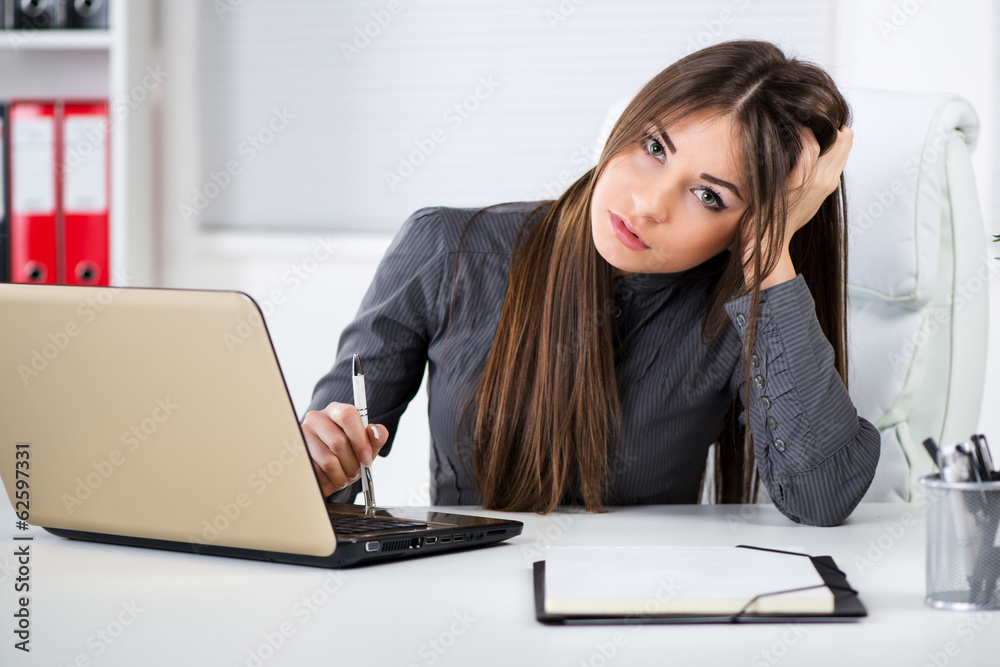 Stressful Businesswoman in the office Stressful Businesswoman in the office