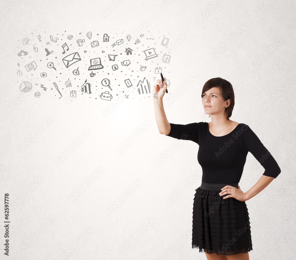 Young woman drawing and sketching icons and symbols Young woman drawing and sketching icons and symbols