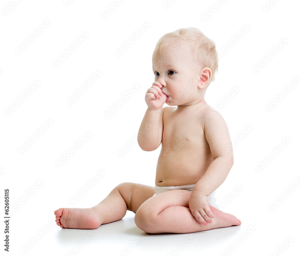 Baby boy suckling thumb isolated on white Baby boy suckling thumb isolated on white