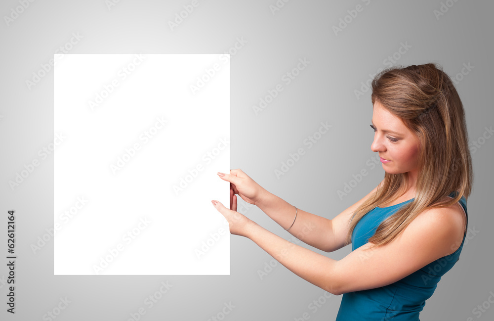Young woman presenting white paper copy space Young woman presenting white paper copy space