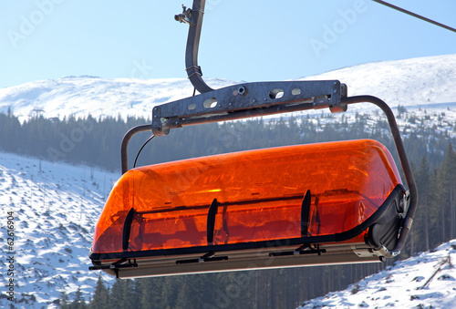 Orange cableway in ski resort Jasna - Low Tatras, Slovakia photo