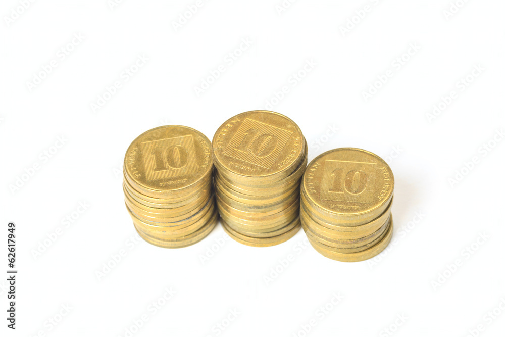 Three stacks of coins Israeli ten agorot Three stacks of coins Israeli ten agorot