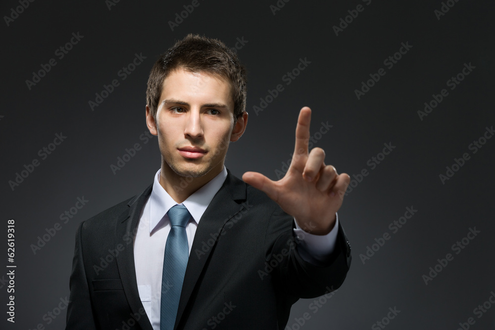 Half-length portrait of manager forefinger gesturing Half-length portrait of manager forefinger gesturing