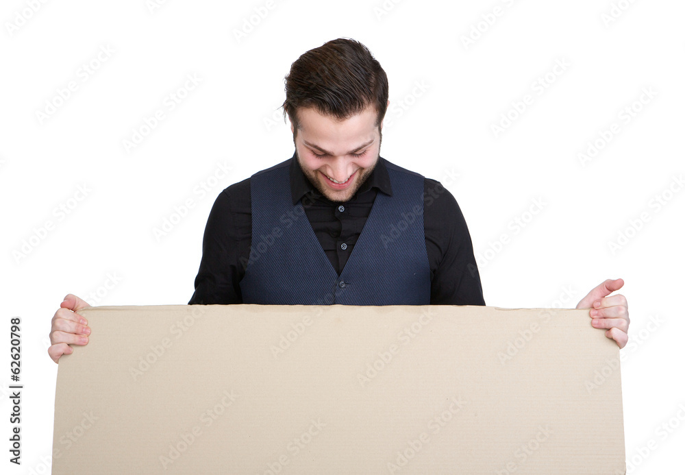 Man looking down at blank poster Man looking down at blank poster