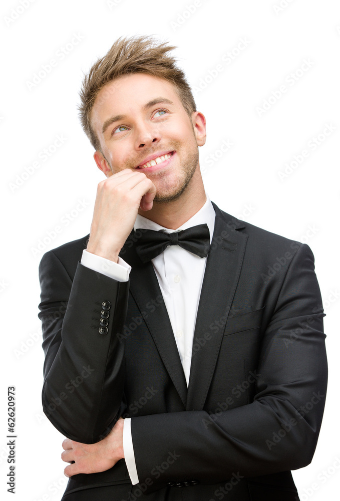 Half-length portrait of smiling businessman touching face Half-length portrait of smiling businessman touching face