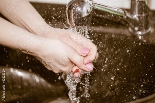 hand washing with tap water