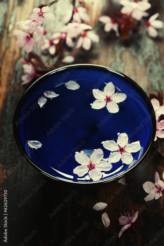spring flowers in blue bowl