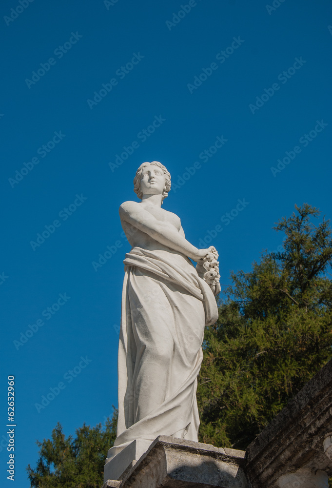 marble sculpture of  ancient goddess with a wreath