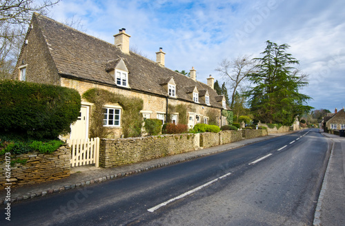 Traditional Cotswold cottages in England, UK. spring.