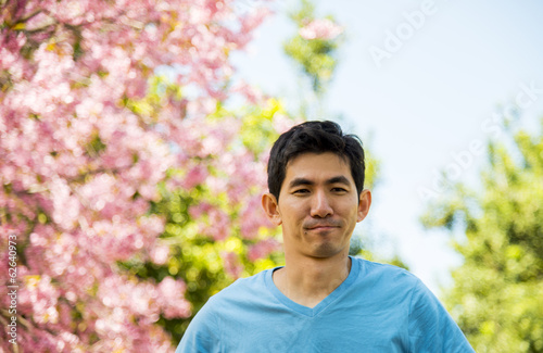 Blue man with pink cherry flower tree1